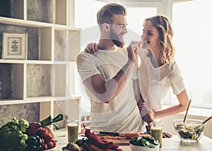 Couple cooking healthy food