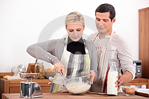 Couple cooking photo