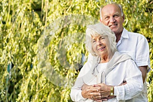 Couple cuddling tenderly photo