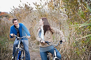 A couple cycling photo