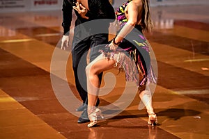 a couple dance a Latin dance. the legs of a dancing couple