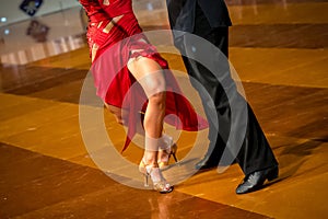 a couple dance a Latin dance. the legs of a dancing couple