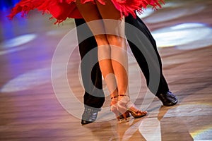 a couple dance a Latin dance. the legs of a dancing couple