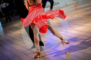 a couple dance a Latin dance. the legs of a dancing couple