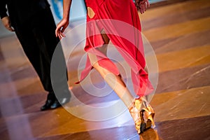 a couple dance a Latin dance. the legs of a dancing couple