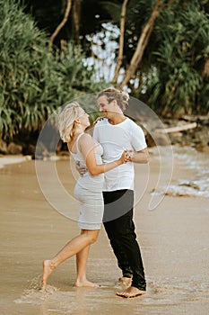 Couple dancing on the beach