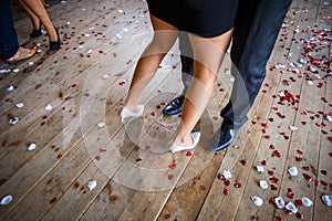 Couple dancing on a dance floor during a wedding celebration party