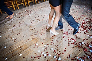 Couple dancing on a dance floor during a wedding party