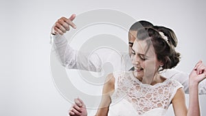 Couple, dancing or happiness in studio with wedding, care or party celebration or cheerful by white background. Man