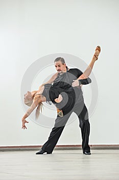 Couple dancing isolated over white background