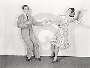 Couple dancing the jitterbug