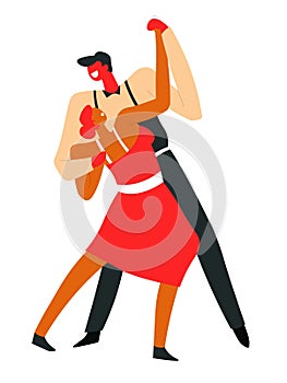 Couple dancing tango and performing on dancefloor at competition