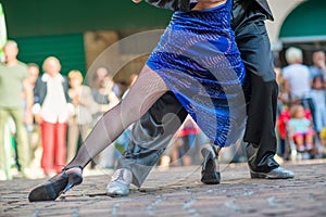 Couple dancing tango in the street