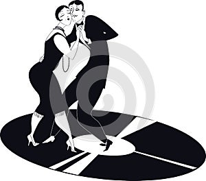 Couple dancing tango on a vinyl record