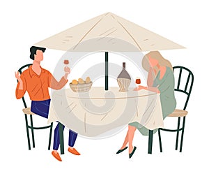 Couple on date drinking wine in restaurant or cafe