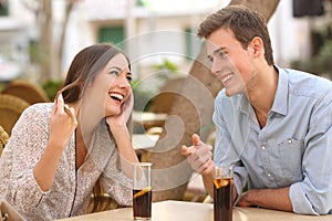 Couple dating and flirting in a restaurant