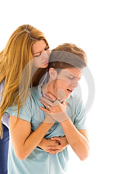 Couple demonstrating first aid procedure for