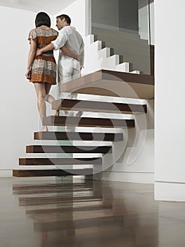 Couple Descending Stairs