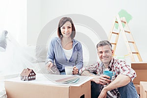 Couple designing their deam house