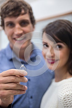 Couple with a diamond ring