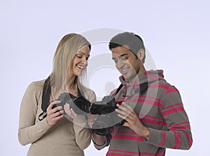 Couple With Digital Cameras