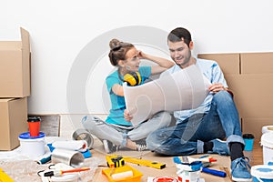 Couple discussing home redesign ideas. photo