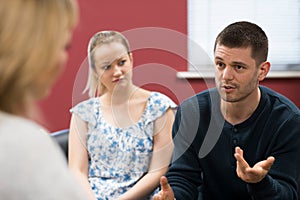 Couple Discussing Problems With Relationship Counselor