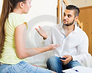 Couple with documents in apartment