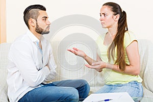 Couple with documents in apartment