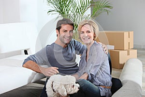 Couple and dog move into home