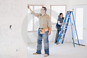 A couple doing building work photo