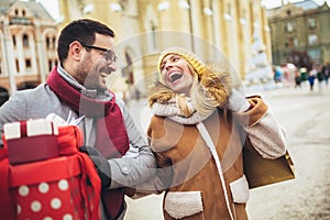 Couple doing Christmas shopping in the city