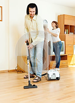 Couple are doing house cleaning