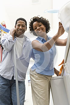 Couple Doing Household Chores