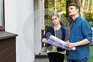 Couple doing property inspection they want to buy