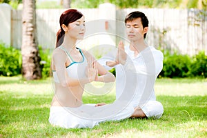 Couple Doing Yoga