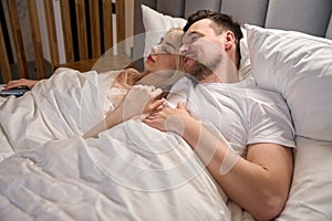 Couple is dozing in the honeymoon suite