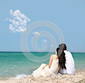 Couple dreaming about house on beach
