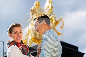 Couple in Dresden with Goldener Reiter statue