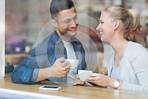 Couple drinking coffee in cafe