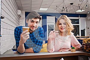 Couple drinking coffee in the cafe