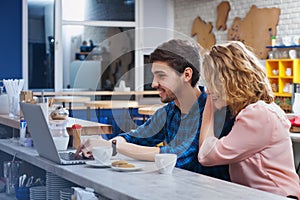 Couple drinking coffee in the cafe