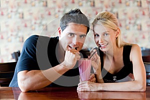 Couple Drinking Milkshake