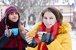 Couple drinking tea in winter