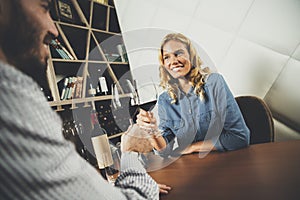 Couple drinking vine in restaurant