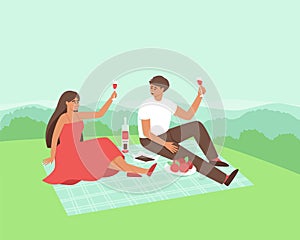A couple is drinking wine in nature
