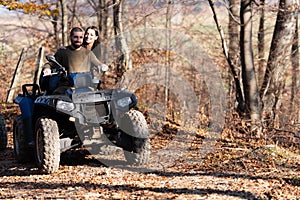 Couple Driving Off-road With Quad Bike or Atv