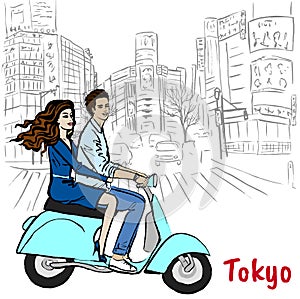 Couple driving scooter