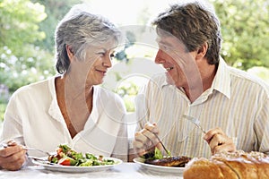 Couple Eating An Al Fresco Meal