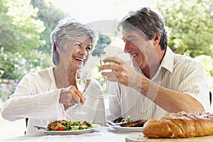 Couple Eating An Al Fresco Meal